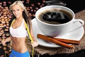 coffee - lady and coffee cup with cinnamon sticks